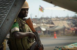 A Rwandan soldier guards a refugee camp in Bangui. Photo courtesy US Air Force/Flickr.